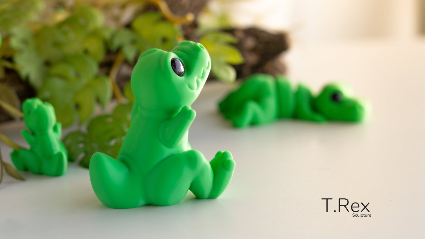 a green toy sitting on top of a white table