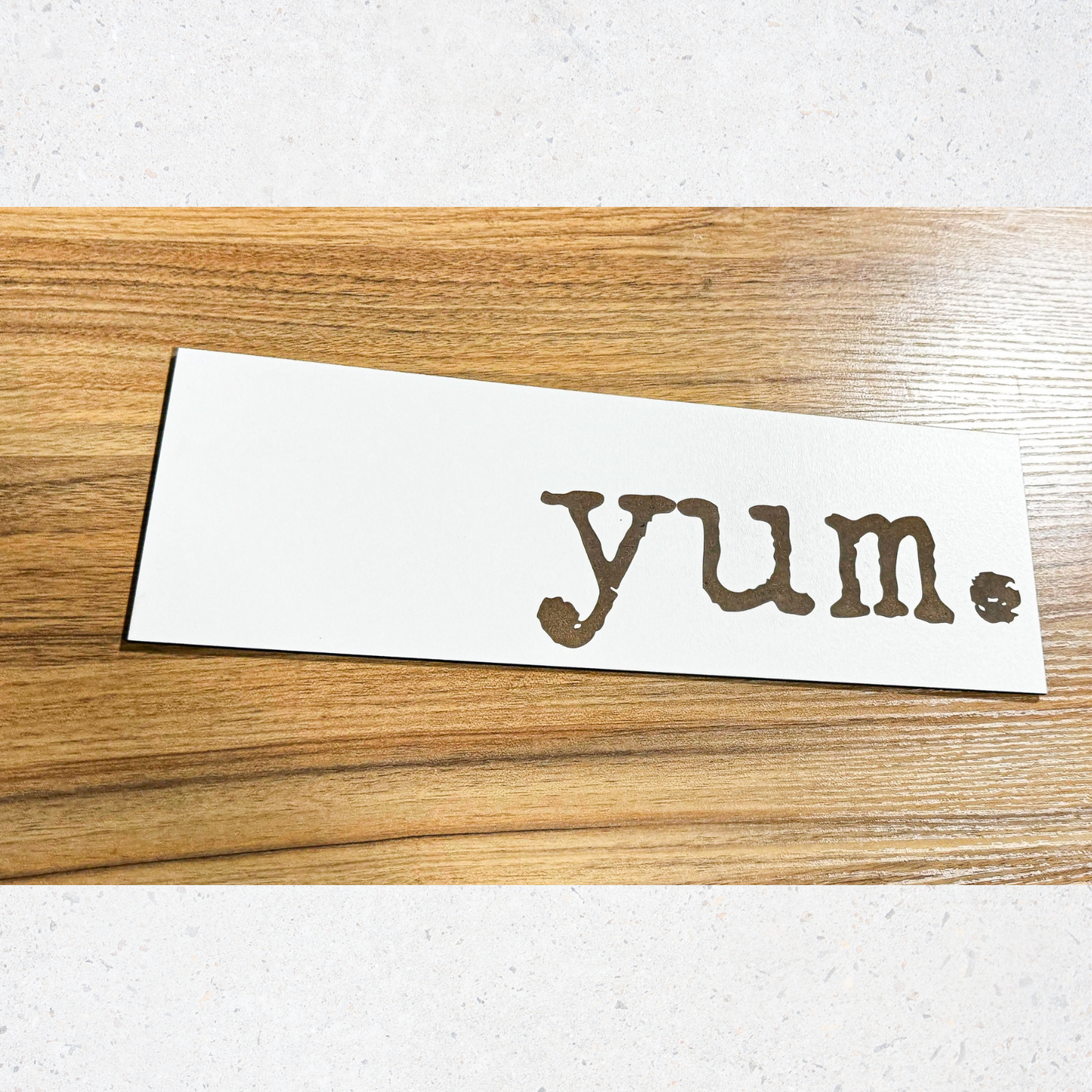 a piece of paper with the word yum written on it