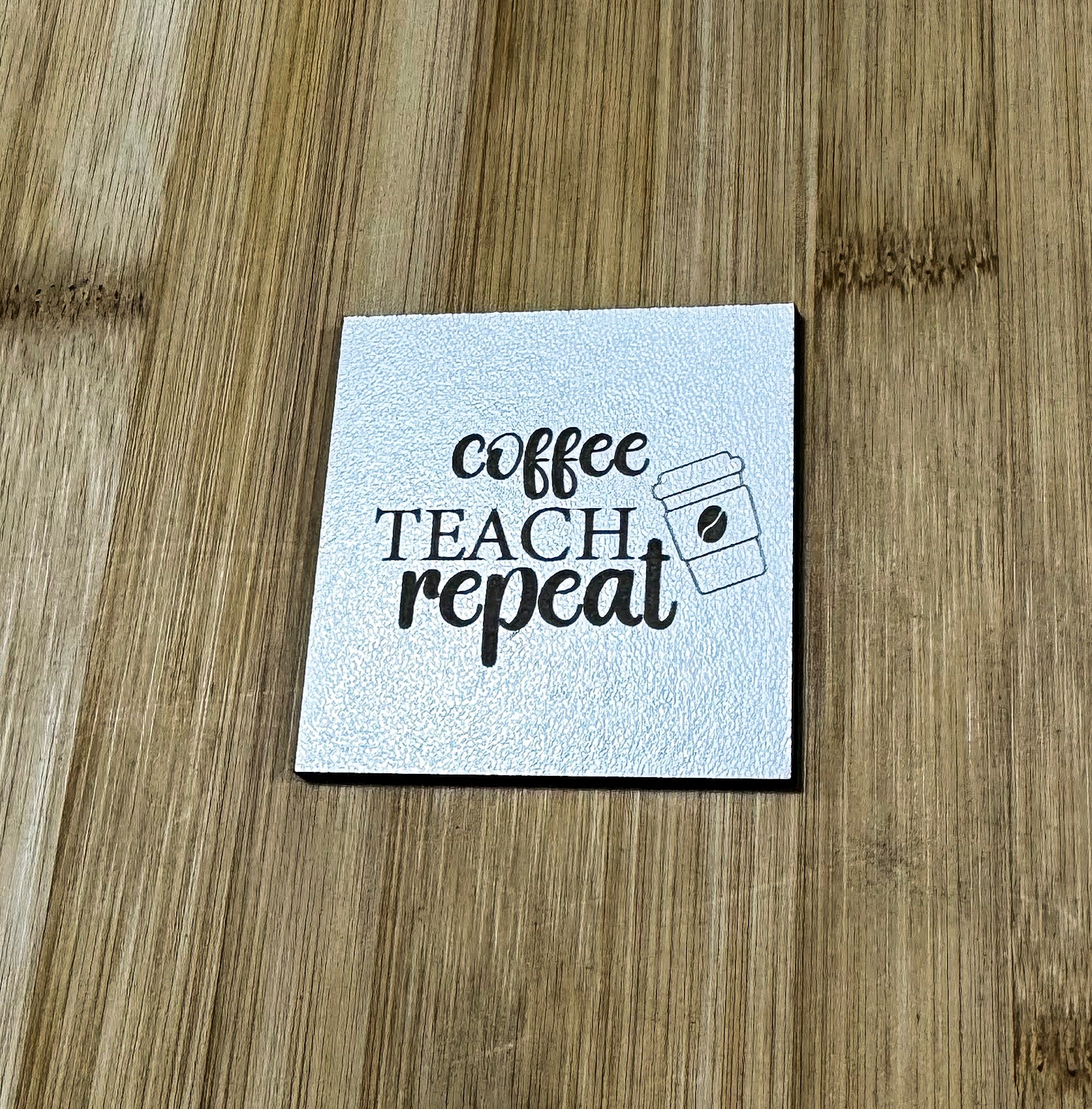 a piece of paper that says coffee teach repeat