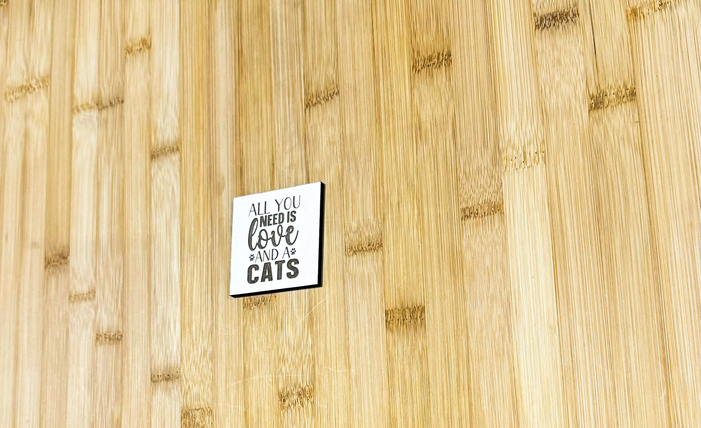 a close up of a wooden surface with a sticker on it