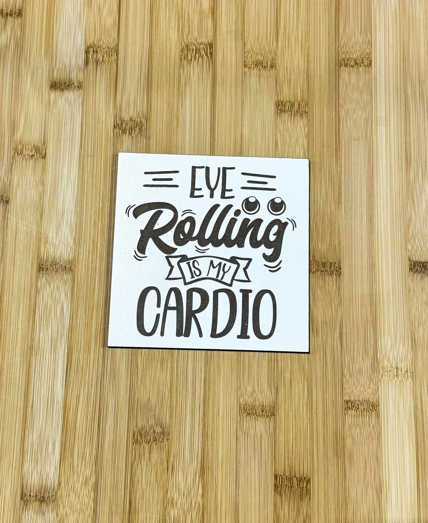 a sticker on a wooden surface that says, eve rolling is my cardio