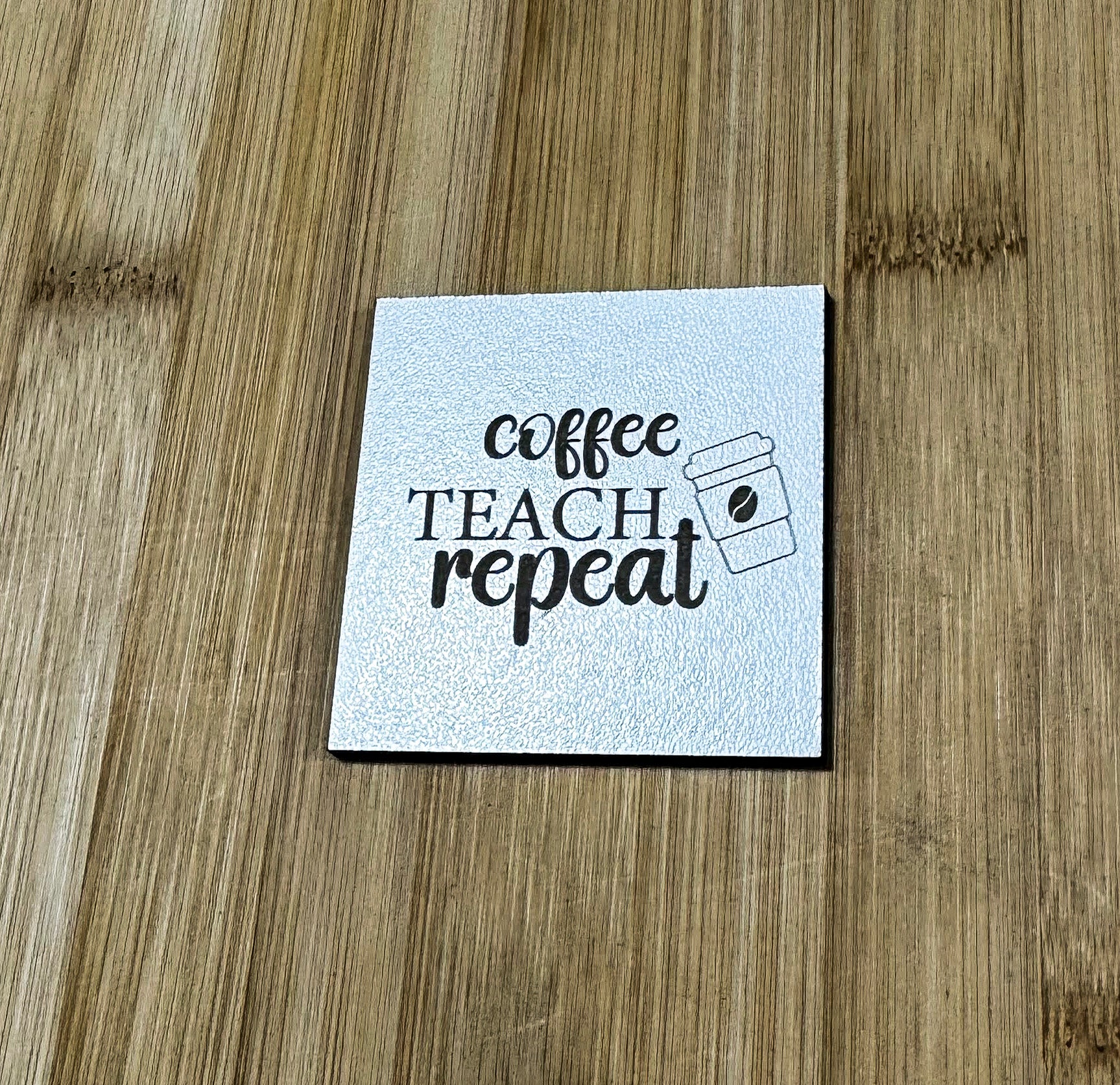 a piece of paper that says coffee teach repeat