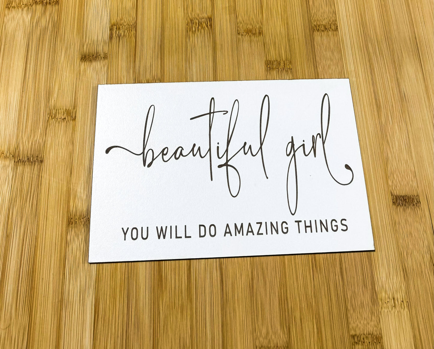 a card that says beautiful girl you will do amazing things