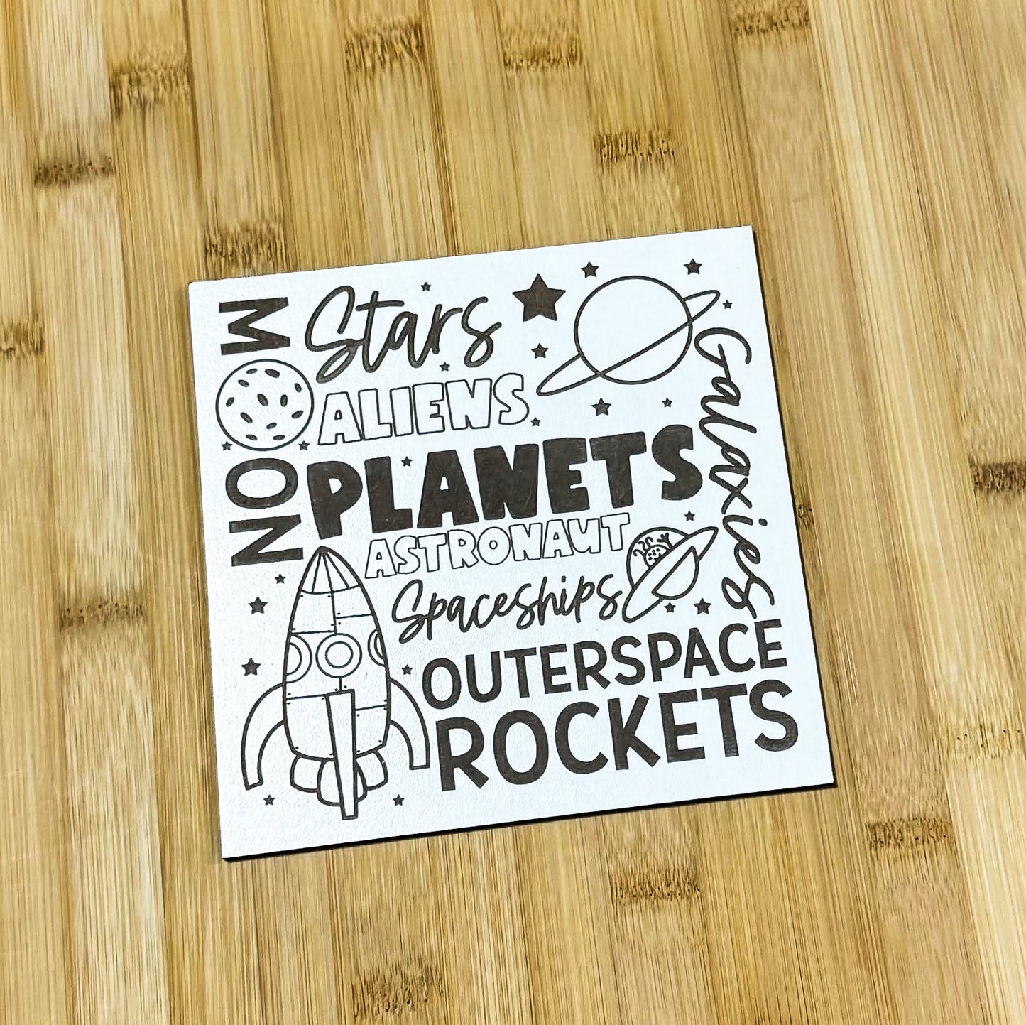 a sticker with a space theme on it