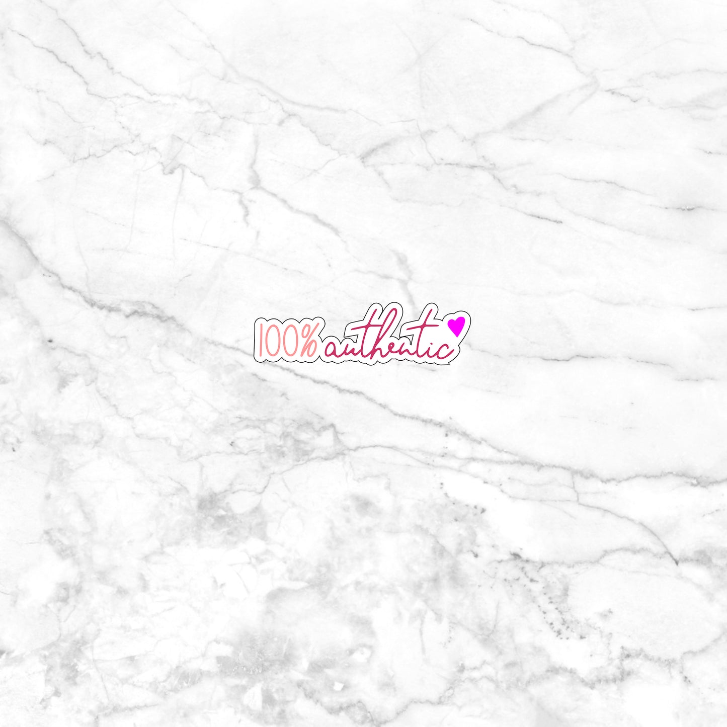 a white marble wall with a pink sticker on it